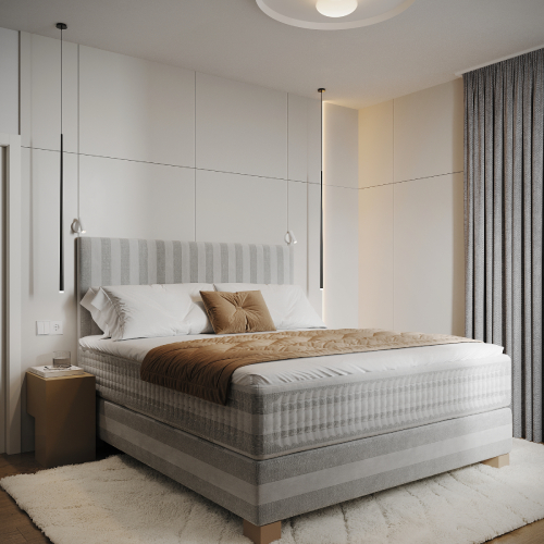 Moderná svetlá spálňa s čalúnenou posteľou, neutrálnymi textíliami, závesným osvetlením a jemným minimalistickým dizajnom.